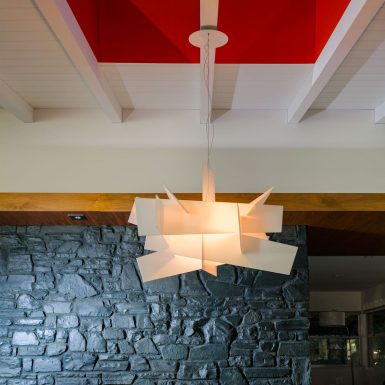 Ranch Redux - Interior view of dining room skylight and modern pendant light fixture. Photograph by Trevor Tondro.